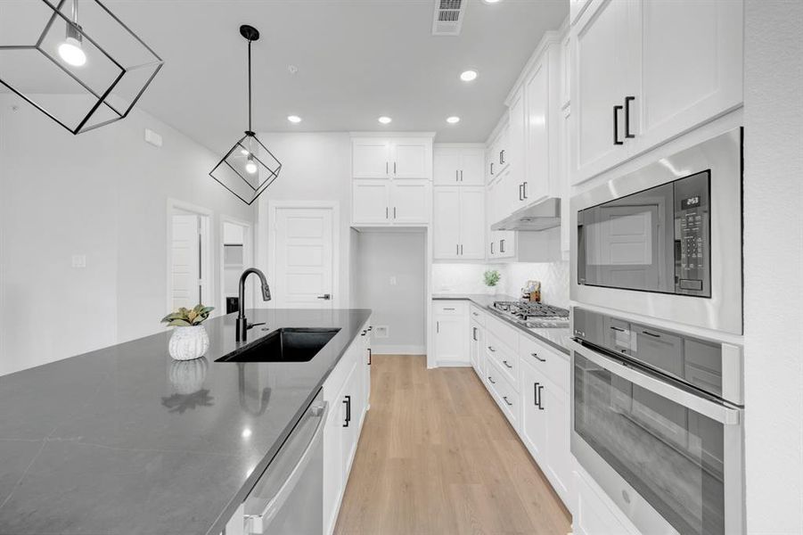 Furnished interior view inside a new home in Hillside at Las Colinas, Irving (Image 16). Furnished interior view inside a new home in Hillside at Las Colinas, Irving (Image 16).