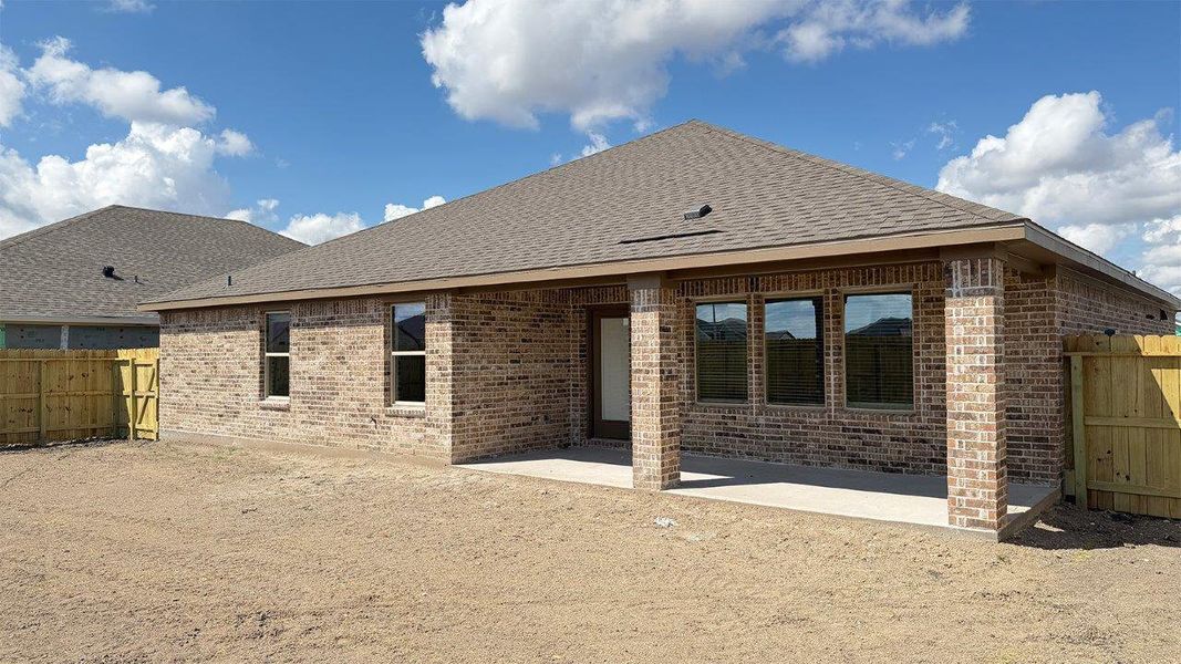 Exterior details and patio area of a home in The Lakes Northwest, Robstown (Image 20).