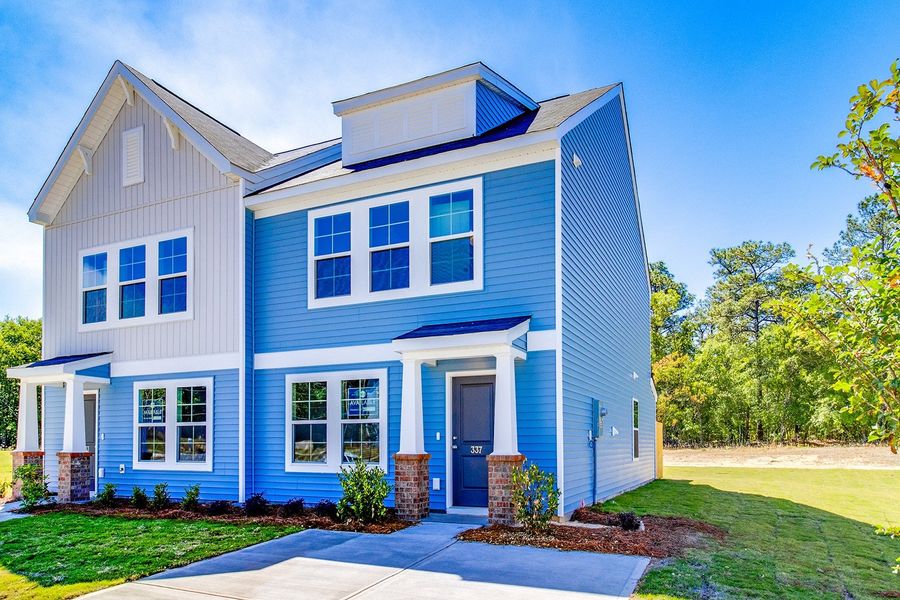 Front exterior of a new home in Padgett Commons, Hopkins, SC, highlighting curb appeal (Image 19).