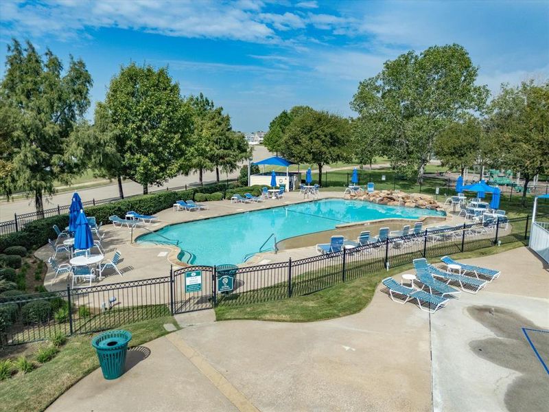Community pool featuring a patio area Community pool featuring a patio area