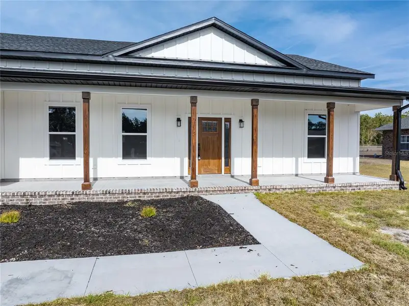 Exterior details and patio area of a home in , Lake City (Image 4).