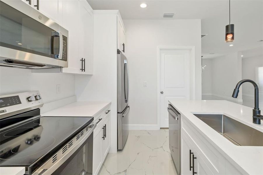 Furnished interior view inside a new home in , Port Charlotte (Image 12).