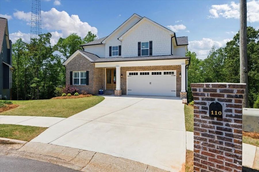 Front exterior of a new home in , Carrollton, GA, highlighting curb appeal (Image 23).