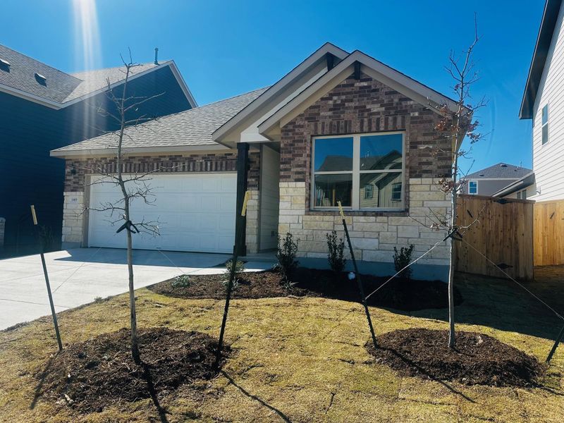 Front exterior of a new home in Patterson Ranch, Georgetown, TX, highlighting curb appeal (Image 12).