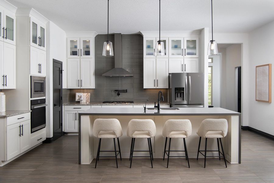Representative furnished interior of a home built from the Alexander II by Ashton Woods in Megan's Landing, Castroville (Image 4).