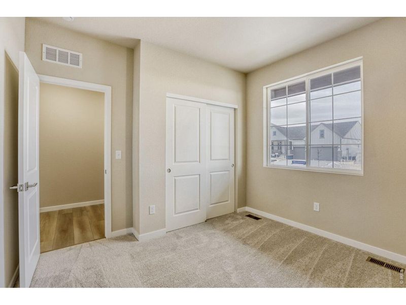 Spacious, unfurnished interior of a new home in Farmstead, Berthoud (Image 23).