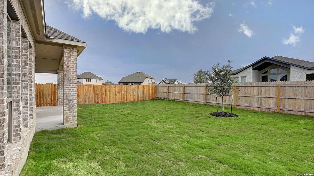 Exterior details and patio area of a home in Alsatian Oaks, Castroville (Image 29).