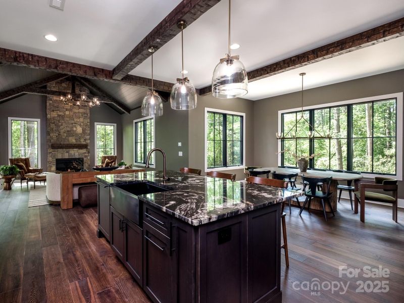 Luxury kitchen flows into open floor plan