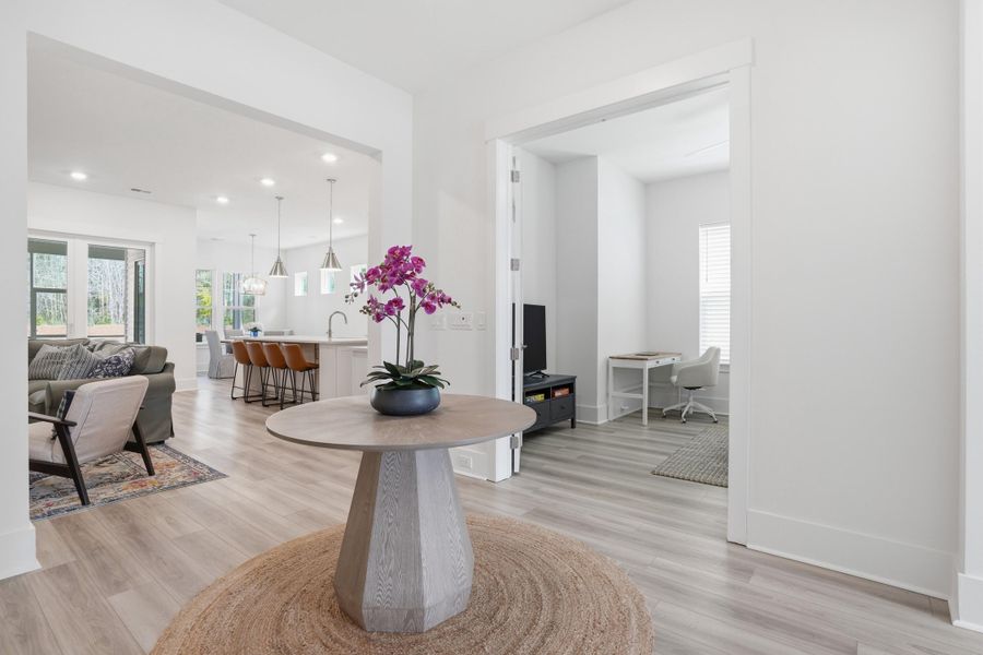 Furnished interior view inside a new home in Summerwind Crossing at Lakes of Cane Bay, Summerville (Image 7).