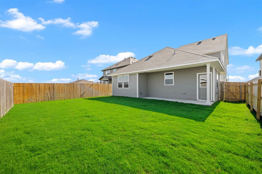 Exterior details and patio area of a home in Rolling Glen, Hutto (Image 23).