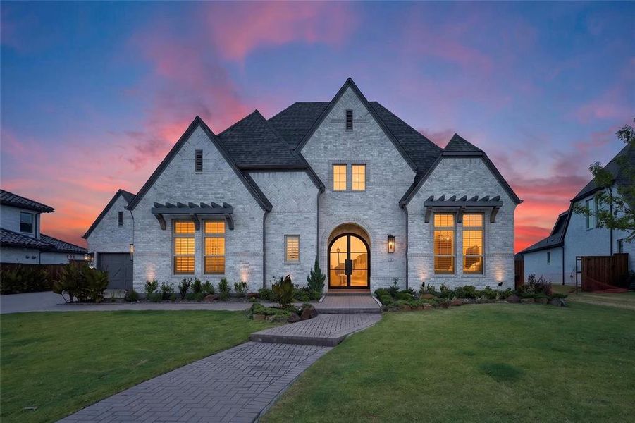 Front exterior of a new home in , Prosper, TX, highlighting curb appeal (Image 2). Front exterior of a new home in , Prosper, TX, highlighting curb appeal (Image 2).