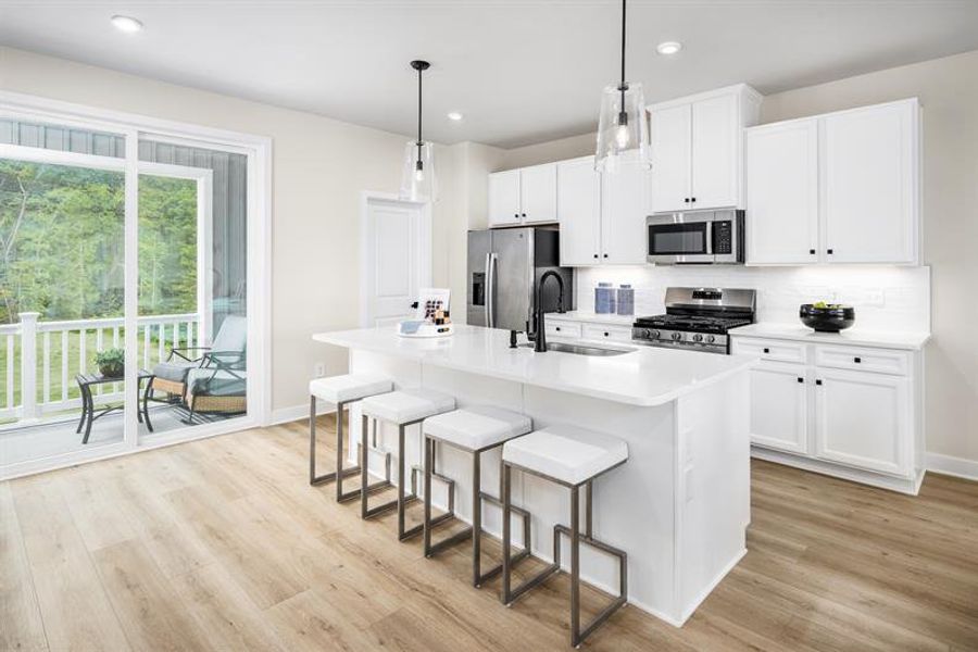 Representative furnished interior of a home built from the Schuman by Ryan Homes in Stowe Branch Townhomes, Charlotte (Image 4).