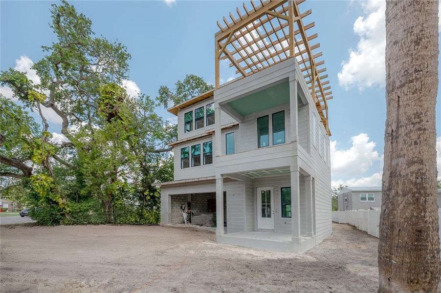 Front exterior of a new home in , Tampa, FL, highlighting curb appeal (Image 19). Front exterior of a new home in , Tampa, FL, highlighting curb appeal (Image 19).