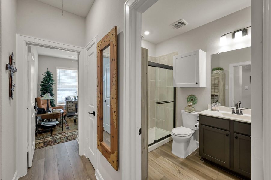 Enhanced Secondary Bathroom Storage – Custom wall cabinetry added to maximize storage and organization. Enhanced Secondary Bathroom Storage – Custom wall cabinetry added to maximize storage and organization.