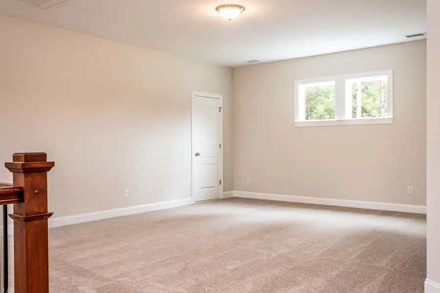 Representative unfurnished interior of a home built from the St Andrews with 3rd Floor Retreat by Greybrook Homes in Edmunds Farm, Clover (Image 35).