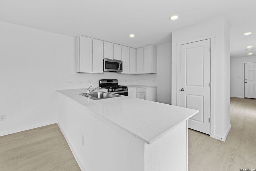 Furnished interior view inside a new home in Spring Grove, St. Hedwig (Image 4).