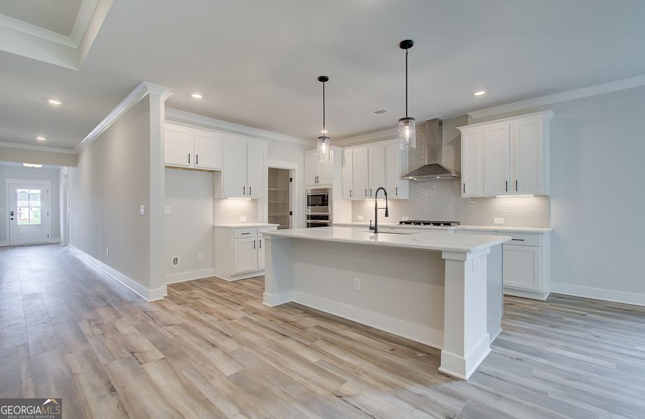 Furnished interior view inside a new home in Ponderosa Farms Reserve, Gainesville (Image 6).