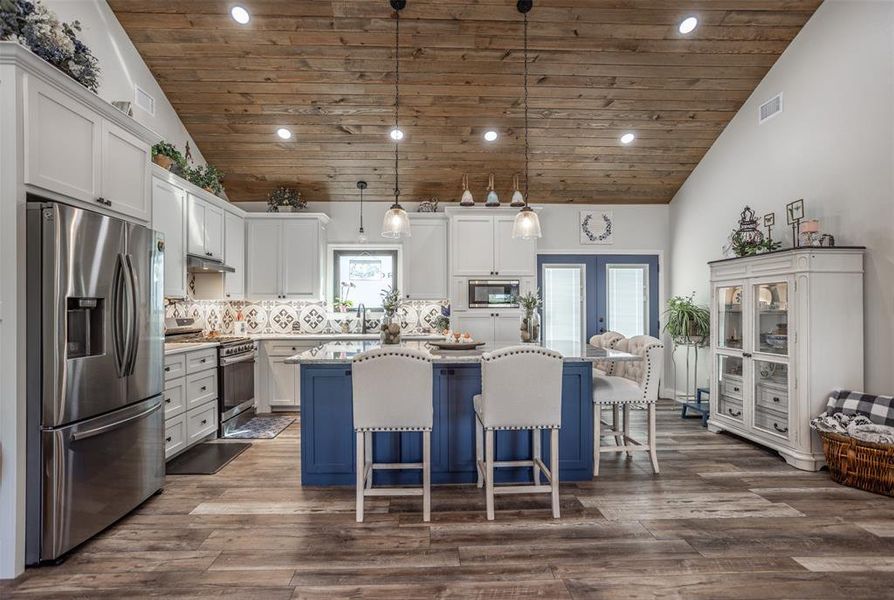 Beautiful Custom Design  Gourmet Kitchen with marble island, stainless appliances and quartz countertops