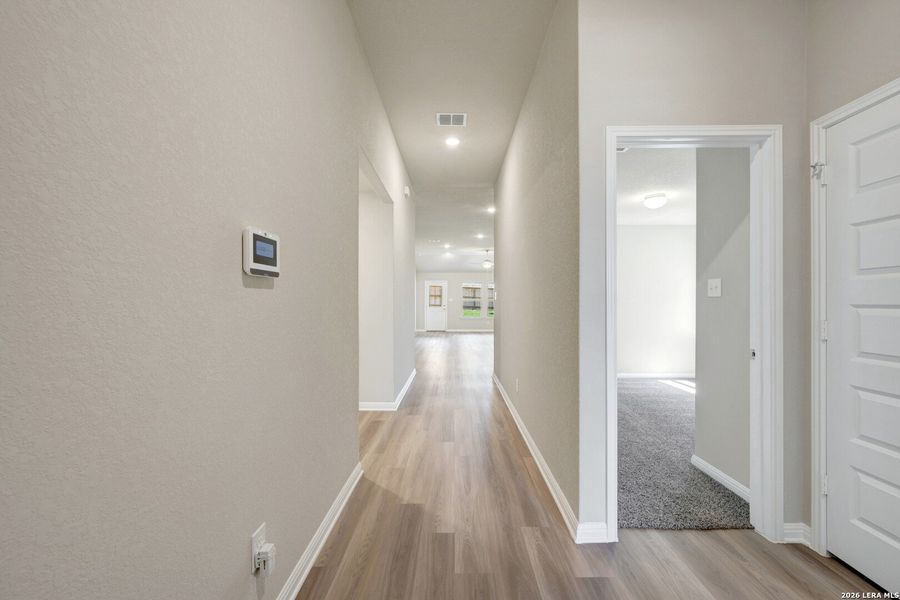 Spacious, unfurnished interior of a new home in Mesquite Ridge, San Antonio (Image 32).
