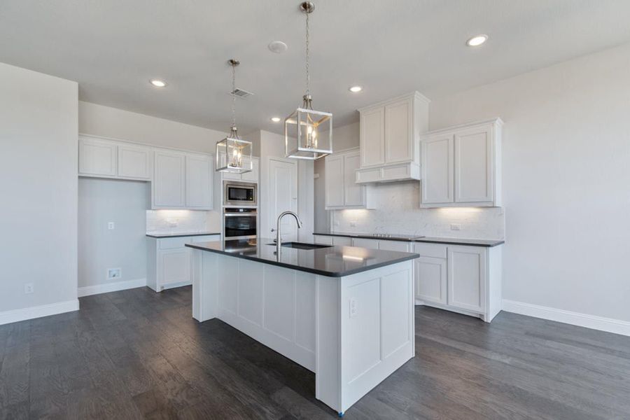 Kitchen | Concept 2406 at The Meadows in Gunter, TX by Landsea Homes