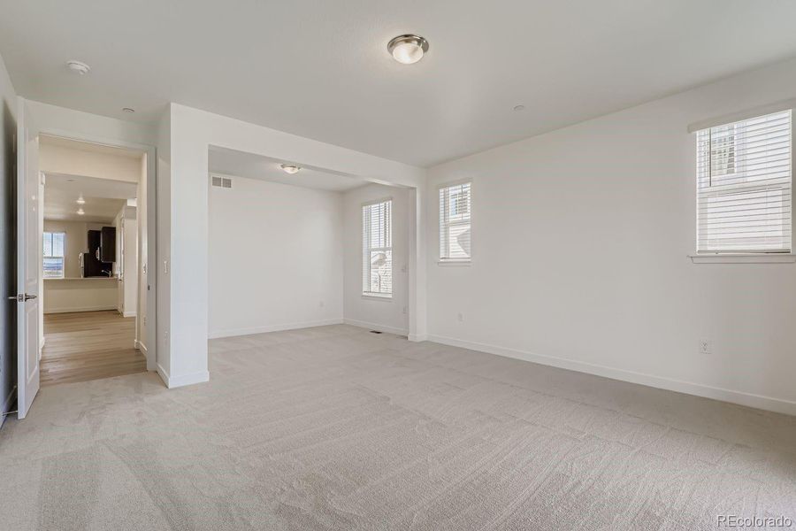 Spacious, unfurnished interior of a new home in Sunset Village: The Grand Collection, Erie (Image 17). Spacious, unfurnished interior of a new home in Sunset Village: The Grand Collection, Erie (Image 17).