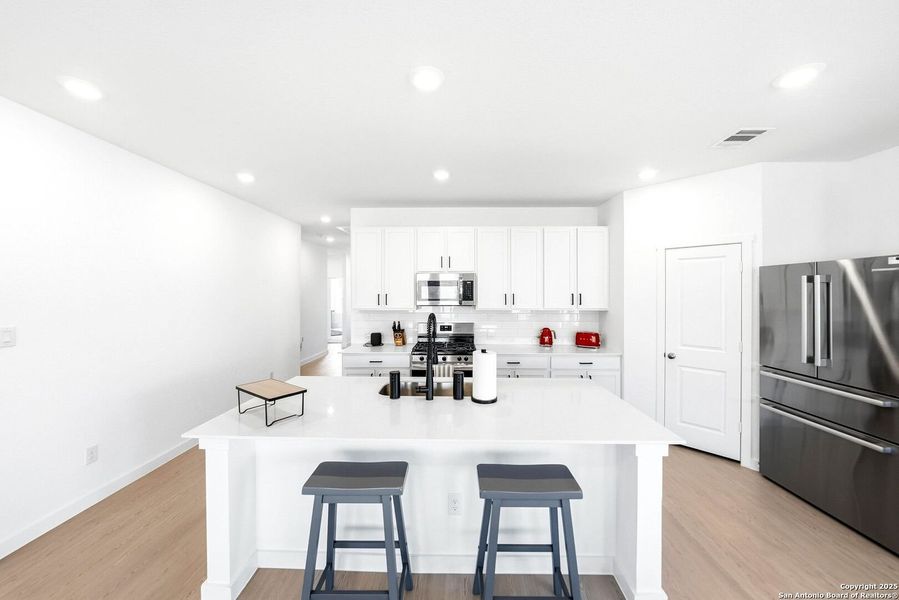 Furnished interior view inside a new home in Hidden Trails: Coastline Collection, Bulverde (Image 5).