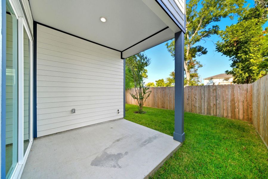 Exterior details and patio area of a home in , Houston (Image 21). Exterior details and patio area of a home in , Houston (Image 21).