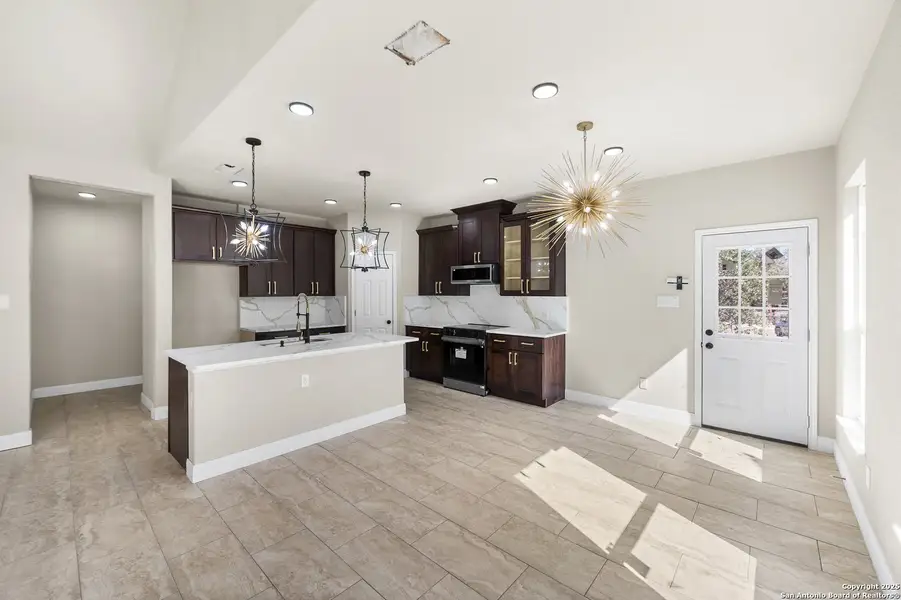 Furnished interior view inside a new home in , Elmendorf (Image 10).