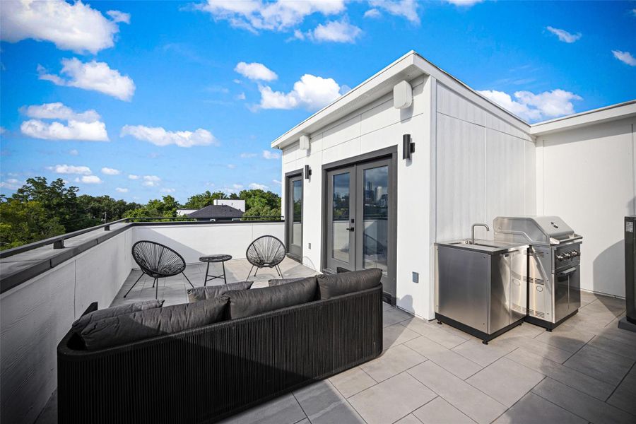 Exterior details and patio area of a home in , Houston (Image 3).