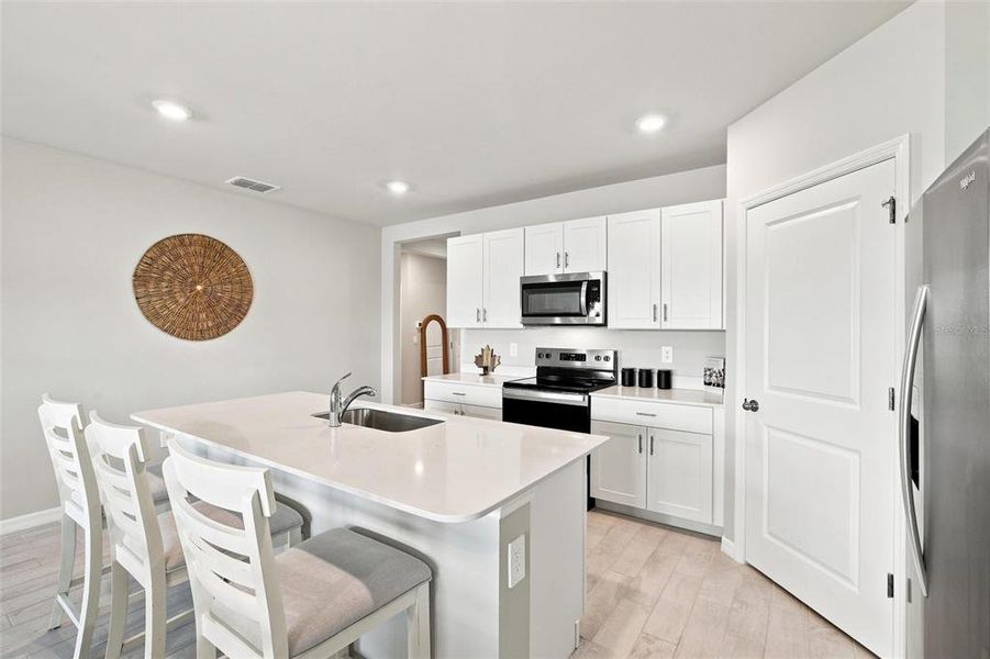 Furnished interior view inside a new home in Central Parc, North Port (Image 12). Furnished interior view inside a new home in Central Parc, North Port (Image 12).