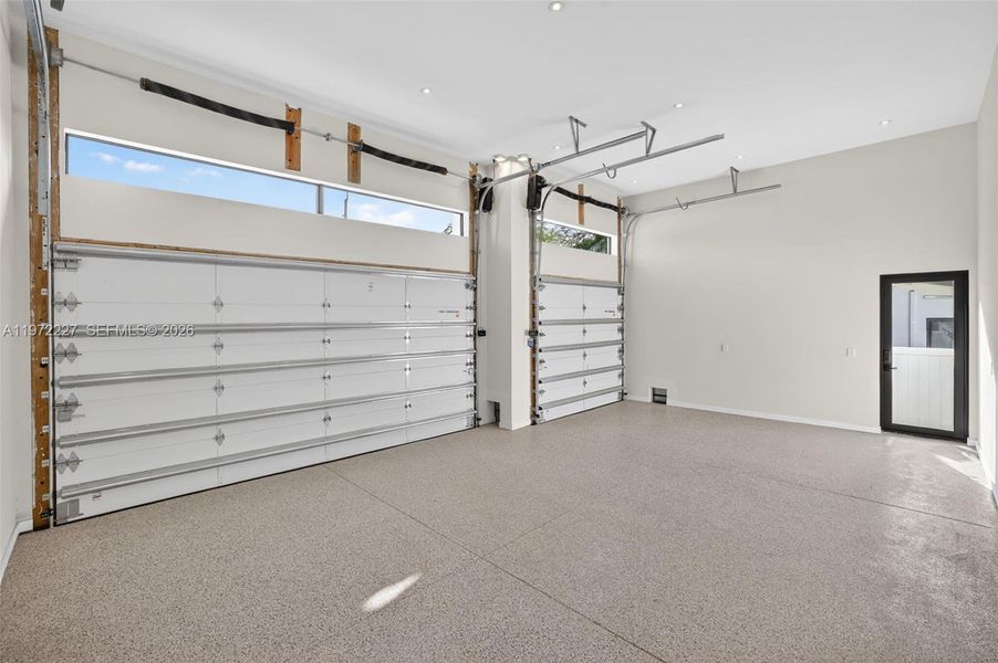 3 Car Garage w/ room for 3 lifts