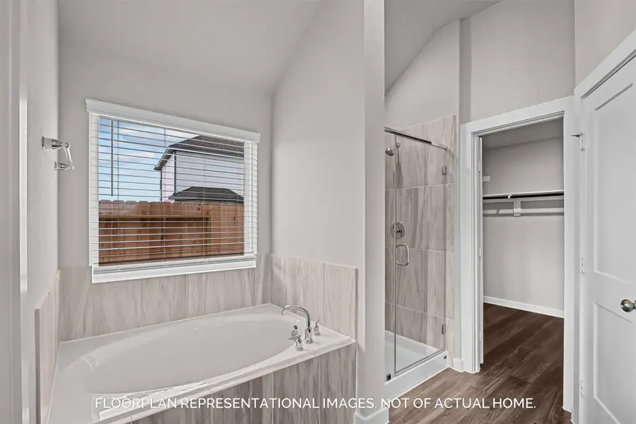 Furnished interior view inside a new home in Lone Star Landing, Montgomery (Image 7).