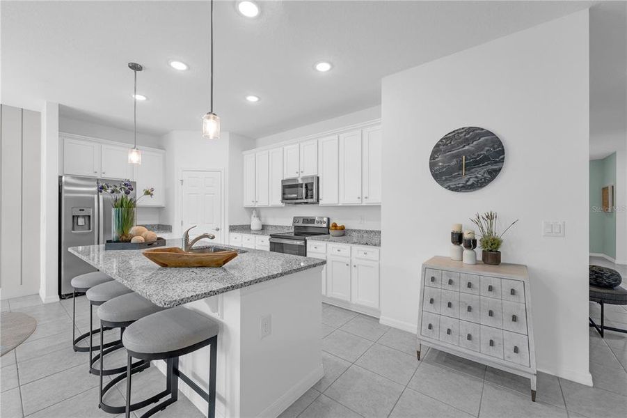 Furnished interior view inside a new home in Covered Bridge at Liberty Bluff, Haines City (Image 27).