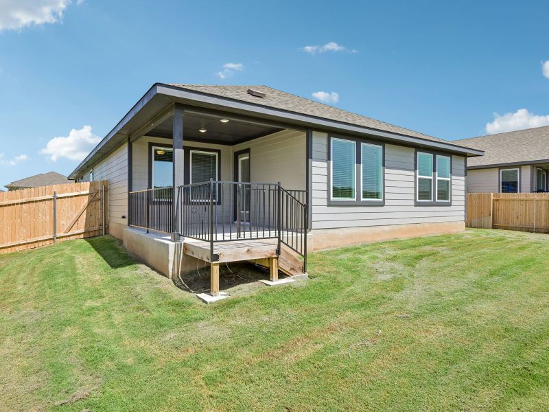 Exterior details and patio area of a home in Creekfall, Burnet (Image 3).