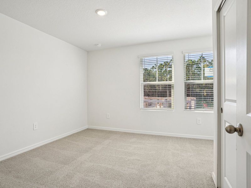 Spacious, unfurnished interior of a new home in The Meadow at Crossprairie Townes, St. Cloud (Image 12).