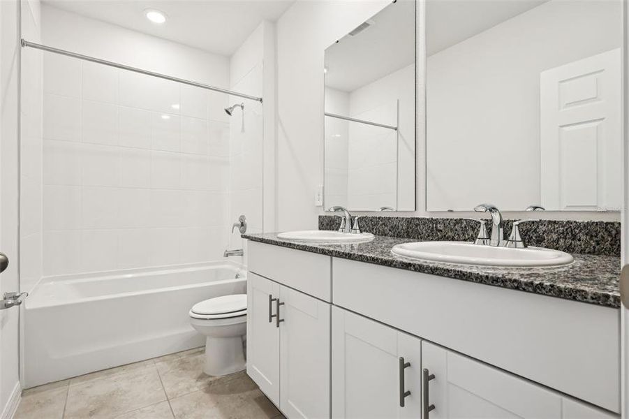 Furnished interior view inside a new home in Lake Deer Estates - Signature Series, Poinciana (Image 5).