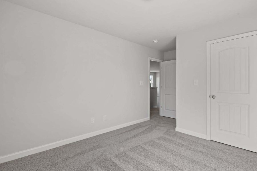 Representative unfurnished interior of a home built from the Camellia by Caviness & Cates Communities in Bartlett Manor, Youngsville (Image 105).