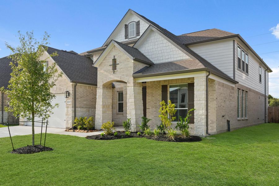 Front exterior of a new home in Morton Creek Ranch, Katy, TX, highlighting curb appeal (Image 13). Front exterior of a new home in Morton Creek Ranch, Katy, TX, highlighting curb appeal (Image 13).