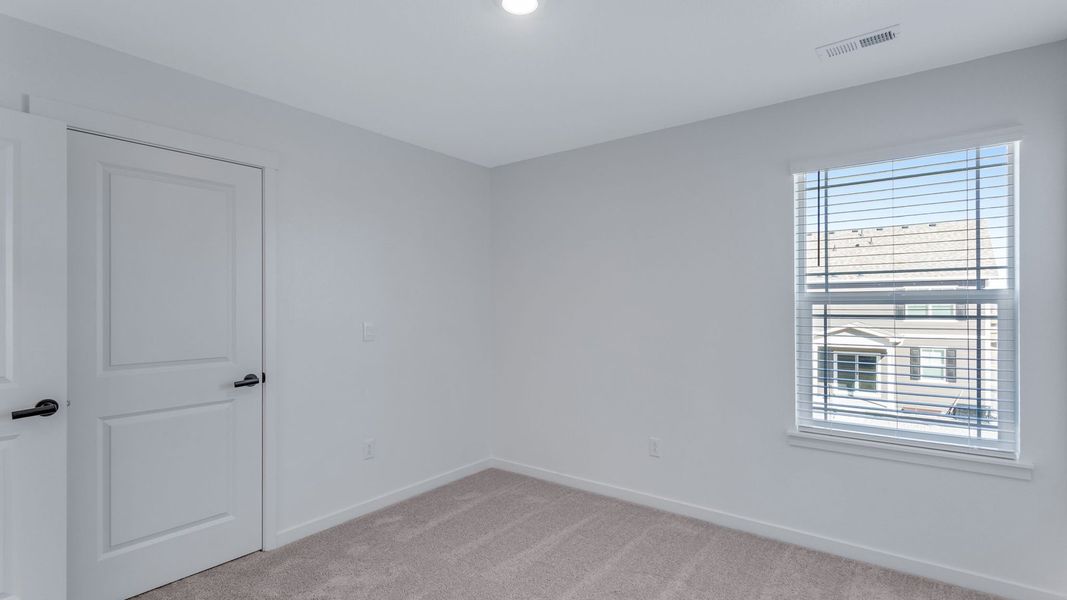 Representative unfurnished interior of a home built from the Calhan by D.R. Horton in Vantage, Berthoud (Image 24).