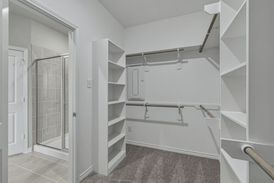 Primary Closet in the Cedar home plan by Trophy Signature Homes – REPRESENTATIVE PHOTO Primary Closet in the Cedar home plan by Trophy Signature Homes – REPRESENTATIVE PHOTO