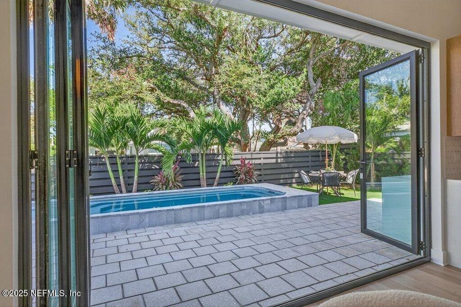 Exterior details and patio area of a home in , Neptune Beach (Image 56).