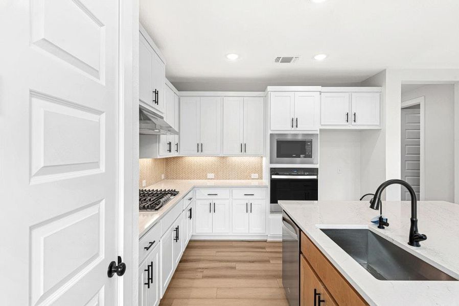 Furnished interior view inside a new home in University Heights, Round Rock (Image 7).