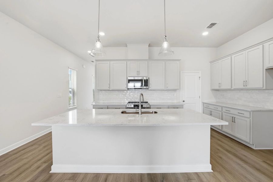 Furnished interior view inside a new home in Blue Heron Retreat, Little River (Image 7).