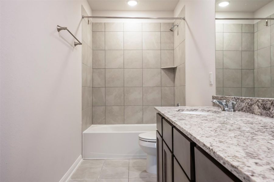 Furnished interior view inside a new home in Sunterra, Katy (Image 7).