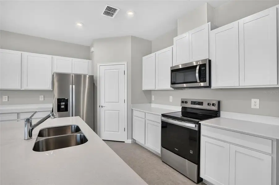 Furnished interior view inside a new home in Sanderling, Palmetto (Image 11).
