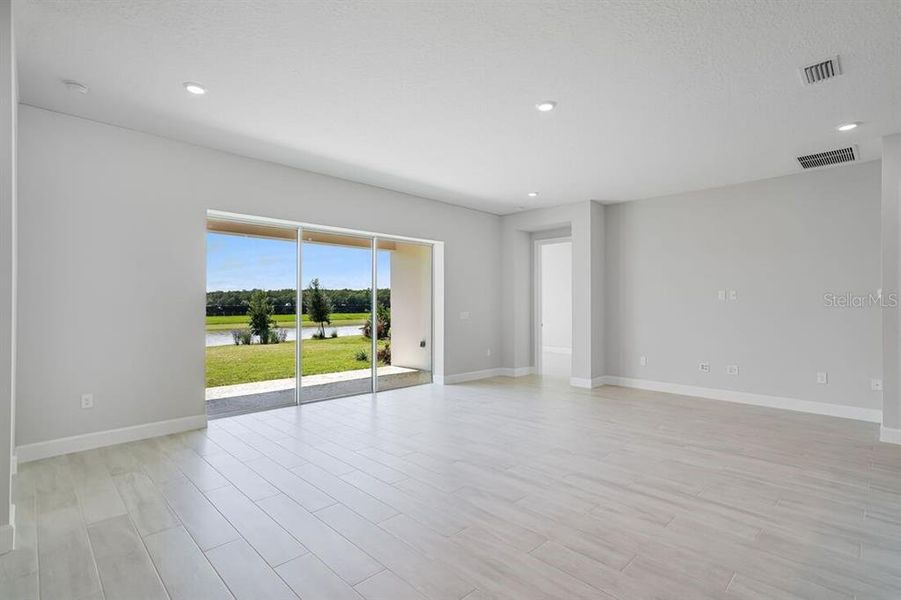 Spacious, unfurnished interior of a new home in Esplanade at Westview, Kissimmee (Image 25).