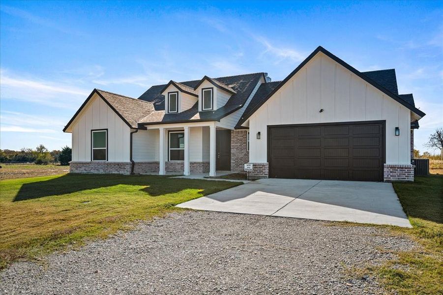 Front exterior of a new home in Briar Branch Estates, Celeste, TX, highlighting curb appeal (Image 1). Front exterior of a new home in Briar Branch Estates, Celeste, TX, highlighting curb appeal (Image 1).