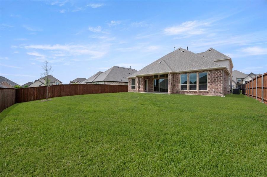 Exterior details and patio area of a home in La Frontera, Fort Worth (Image 24).