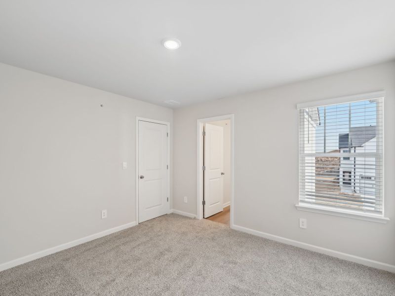 Spacious, unfurnished interior of a new home in Brooks Lake, Loganville (Image 18).