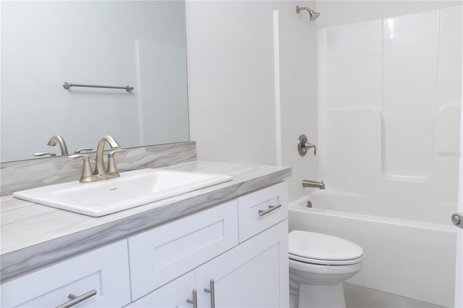 Furnished interior view inside a new home in Rolling Hills, Bell (Image 9).